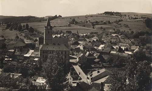 Rožmberk nad Vltavou s mostem přes řeku při pohledu z hradního návrší
na pohlednici krumlovského fotografa Josefa Wolfa