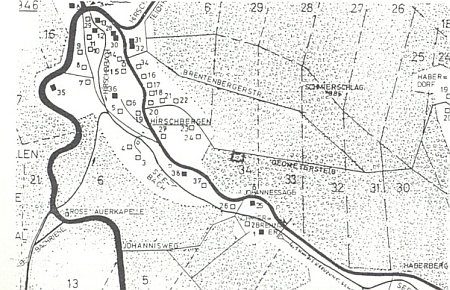 Mapka obce Jelení a pamětní kámen na cestě mezi Jelením a Ovesnou z roku 1888