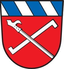 "Mluvící" znak bavorského městyse Reisbach s tzv. "lopatkovým nožem" (Reißhaken) k řezání značek do dřeva