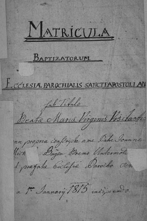 Titulní list ondřejovské křestní matriky s datem 1. ledna 1815 a se jménem faráře Michaela Bayera, charakterizovaného výrazem "Boemus Untermoldauensis", tj. "Čech dolnovltavický"