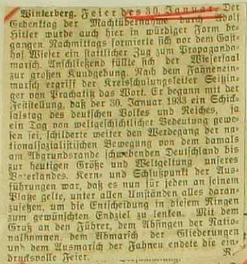 Novinový výstřižek ve vimperské městské kronice o zdejší oslavě 11. výročí Hitlerova nástupu k moci s Rammelovou autorskou šifrou na konci - odkud jen všichni známe toho démona souhlasu?