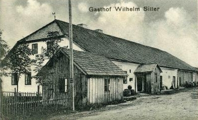 Někdejší hostinec Wilhelma Sittera v Borových Ladech čp. 41 na výřezu staré pohlednice...