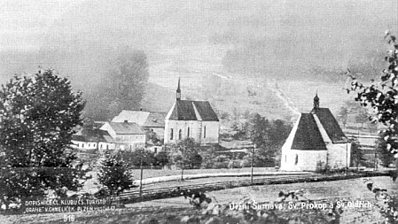 Pohlednice Loučovic s prastarými kostelíky sv. Prokopa a sv. Oldřicha (viz i Rudolf Barth a Marie Stopferová)